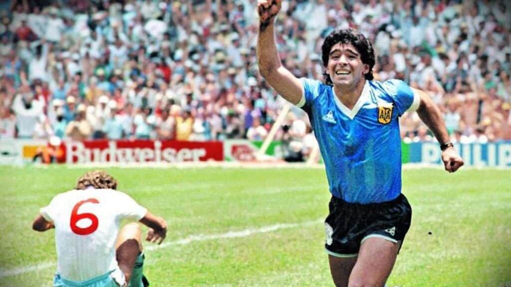 Diego Maradona, exultant but mano de Dios